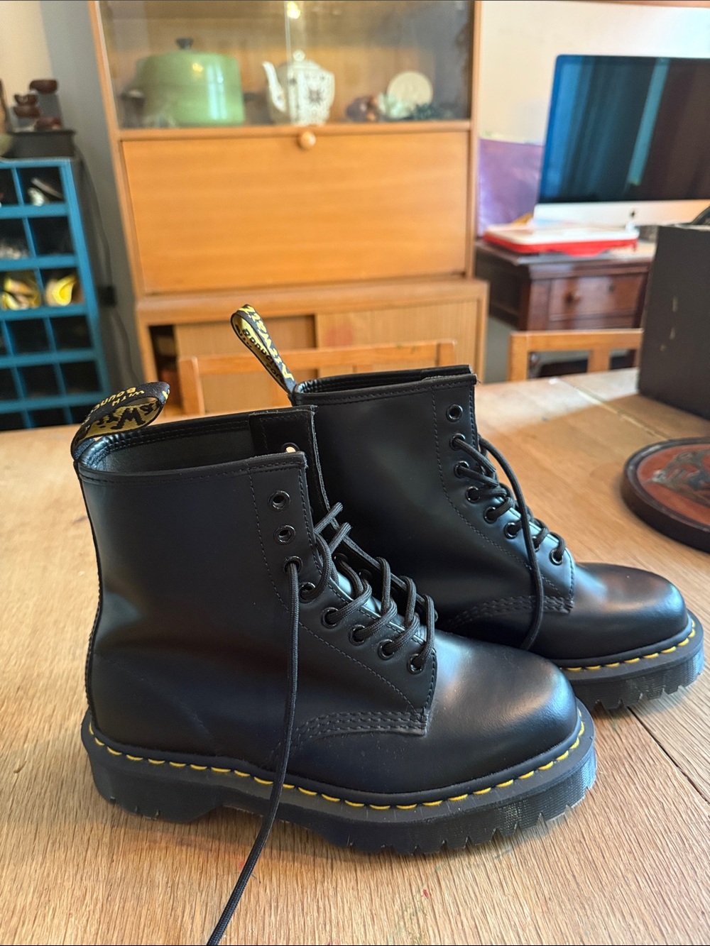 Dr. Martens Black Leather 8-Eye Lace-Up Boots with Yellow Stitching
